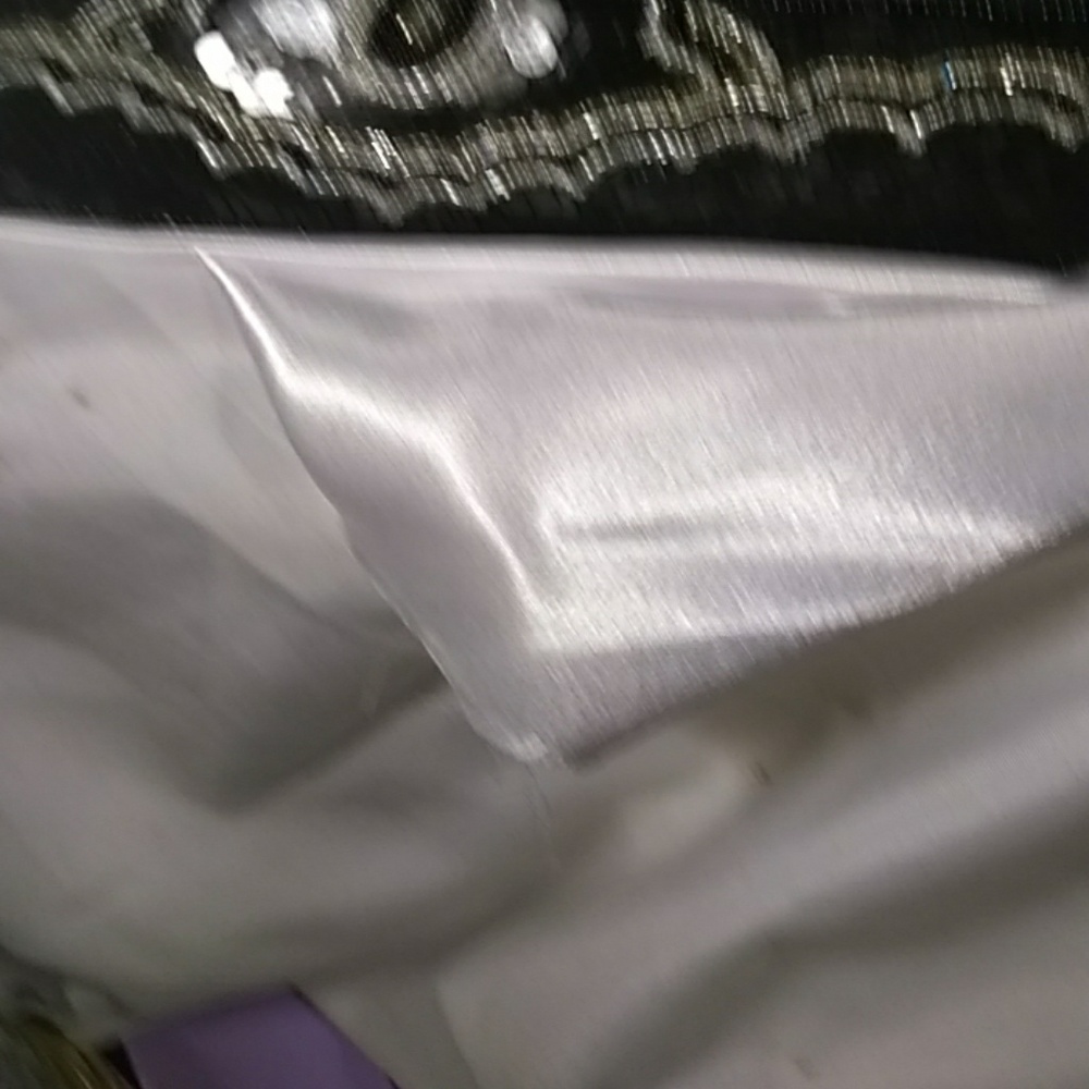 KC Malhan clutch bag